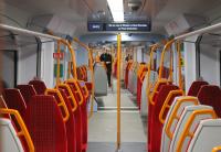 Originally ordered by South West Trains the new Class 707 EMUs are operated by London and South Western but will retain the bright red SWT upholstery for some time. 707013 has just arrived at Windsor on 27th January 2018, allowing a view of the interior, including the open connections linking the five coaches of the set.<br><br>[Mark Bartlett 27/01/2018]