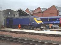 Grab shot from a passing train showing ScotRail HST power car 43012 receiving attention at Haymarket depot. 30th January 2018.<br>
<br><br>[Bill Roberton 30/01/2018]