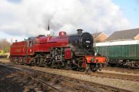 Guest engine at the GCR from the East Lancashire Railway, LMS <I>Crab</I> 2-6-0 13065 is seen in the yard at Loughborough Central with the sun lighting up its crimson paintwork.<br><br>[Peter Todd 26/01/2018]