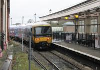 GWR 165137 stands in the truncated Windsor & Eton Central platform, which will now only accommodate a 3-car DMU. This image was taken from just behind the re-sited buffers. The rest of the old station, behind the camera, has been turned into a shopping mall but retains some railway features. [See image 47854] showing the station before the long platform disappeared. <br><br>[Mark Bartlett 27/01/2018]