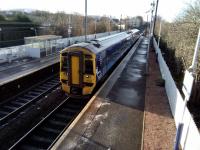 158708 pulls into Slateford with a Glasgow Central to Waverley stopping service on 18th January 2018. Odd to think that for a few years post-Beeching this strangely anonymous place (sorry Slateford) had Edinburgh's only suburban station.<br>
<br>
<br><br>[David Panton 18/01/2018]
