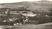 Spean Bridge station seen from above, just to the south of the station. On the left is the I&FAR building and on the right the WHR building (only the roof is visible). Postcard view of unknown date.<br><br>[Ewan Crawford Collection //]