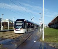 A city-bound tram calls at Edinburgh Park Central, in the city's<br>
out-of-town financial quarter, on 2 February 2018. This is one of four tram<br>
stops with Edinburgh in the name, none of which​​ is in central Edinburgh.<br>
The name 'Edinburgh Park Central' particularly must surely confuse some<br>
tourists.<br>
<br><br>[David Panton 02/02/2018]