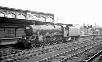 One of Blackpool Central's Jubilees, no 45571 <I>South Africa</I> stands alongside the south end of platform 4 at Carlisle on 17 August 1963 awaiting the signal to head for Upperby shed. The locomotive had earlier brought in the 10.35 summer Saturday train from Blackpool to Perth and Edinburgh (Princes Street). <br><br>[K A Gray 17/08/1963]