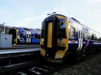 During the day anyway there seems to be a set stabled at Tweedbank's Platform 2 (left) while Edinburgh trains come and go from Platform 1. I have long given up hope that the last units will ever be painted out of the pre-2008 livery. At least it gives a bit of variety. 4th February 2018<br>
<br><br>[David Panton 04/02/2018]