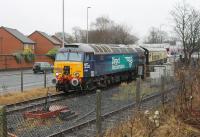 After a long and circuitous run from Eastleigh, with several changes of motive power (DRS 37, 88 and 68 also used on the day), the Pathfinder Tours <I>Blue Boys Ribble Rouser</I> crosses Strand Road in Preston and arrives right time onto Ribble Steam Railway metals behind DRS 57304 <I>Pride of Cheshire</I>. DRS 66428 was on the rear of the train on this leg. 10th February 2018. <br><br>[Mark Bartlett 10/02/2018]