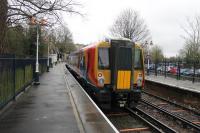 458509, at the head of a ten coach train, stands at the end of the long curving platform at Windsor & Eton Riverside on 27th January 2018 whilst waiting to return to London Waterloo. A small section of the huge castle can be seen above the train roof looking down on the scene.<br><br>[Mark Bartlett 27/01/2018]