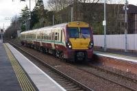 334034 passes Bowling at speed on its way east with a service from Helensburgh on 27 April 2013.<br><br>[John McIntyre 27/04/2013]