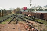 Looking west in 1993 from the Haig's sidings at Markinch, which branched off the Auchmuty/Leslie branch beyond the fence.<br>
<br>
<br><br>[Bill Roberton //1993]