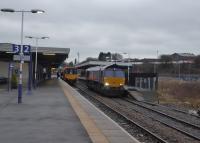 The Carlisle to Crewe infrastructure trains are often lengthy and heavy [See image 47899] but on 14th February 2018 DRS 66432 ran light engine through Platform 4 in Blackburn. In Platform 2, 150117 was ready to depart for Wigan via Todmorden and Manchester. <br><br>[Mark Bartlett 14/02/2018]