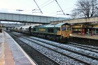 There is very little coal traffic through Lancaster now but 66556 put in an appearance early on the morning of 12th February 2018 working empties from Crewe Basford Hall to Greenburn Opencast Mine in Ayrshire. There was more snow further south but only a <I>dusting</I> at Lancaster. <br><br>[Mark Bartlett 12/02/2018]