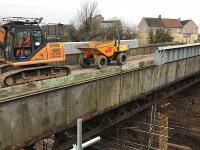 Assorted plant sits on the rather rusty overbridge at Baillieston in February 2018. The bridge is now closed for demolition and the replacement is due to open to traffic in September 2018.<br><br>[Colin McDonald 22/02/2018]