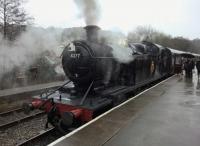 Who says steam engines are bad for public health? GW4277, a 2-8-0 still carrying an Aberbeeg shed plate, demonstrates its ability to provide public sauna facilities at a Churnet Valley steam gala.<br><br>[Ken Strachan 03/02/2018]