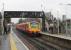 A London Waterloo to Weybridge service, formed by nearly new Siemens EMU 707026, calls at Egham station on 27th January 2018. Built for South West Trains these bright red five-car sets are now operated by London and South Western but the livery will no doubt be around for quite a while. <br><br>[Mark Bartlett 27/01/2018]