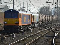 GBRf 92028 and 66720 approach Carlisle with the Wembley - Irvine china clay train on 21st February 2018.  The 92 would be detatched at Kingmoor and return to the station for stabling.<br>
<br>
<br><br>[Bill Roberton 21/02/2018]