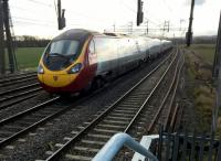 They came out of the sun at me, Captain. A Euston to Manchester service makes a dramatic approach to Polesworth.<br><br>[Ken Strachan 01/02/2018]