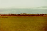 An unidentified class 86 at the head an Inter-City Northbound passing Carstairs South Junction in the early 1990s. Carstairs Penitentiary in the background.<br><br>[Gordon Steel //1990]