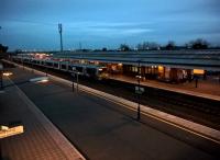 The 17.34 to Birmingham Moor Street comes to a halt in Bicester North at sunset on 16th February 2018.<br><br>[Ken Strachan 16/02/2018]