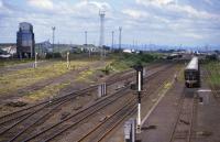 A view north, perhaps around 1985, of the south end of Millerhill Yard looking north. The down yard reception sidings have been relatively recently lifted.<br>
<br><br>[Bill Roberton //1985]