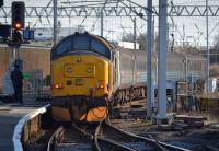 DRS 37401 propels the 14.35 from Carlisle to Barrow-in-Furness out of Platform 1 on 21st February 2018.<br>
<br>
<br><br>[Bill Roberton 21/02/2018]
