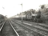 Parkhead based V3 2-6-2T 67628 passing through Knightswood North Junction on 1 August 1957 with a Milngavie - Bridgeton train. <br><br>[G H Robin collection by courtesy of the Mitchell Library, Glasgow 01/08/1957]