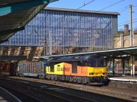 Colas 60087 passes through Carlisle with a very heavy Kingmoor - Chirk logs train that was routed over the Settle & Carlisle line. 21st February 2018.<br>
<br>
<br><br>[Bill Roberton 21/02/2018]