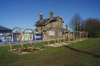 The former station of Algarkirk and Sutterton on the line between Spalding and Boston on 25 February 2018 and now operating as a building and doors store. This view is along where the platforms used to be with Boston to the right. Much of the trackbed between Spalding and Boston is now used for the A16 road.<br><br>[John McIntyre 25/02/2018]