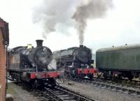 Overcoaled, overwatered, and over here. Aberbeeg's 2-8-0T 4277 and USATC 5197 indulge in a little competitive smoking at Cheddleton on 3rd February 2018.<br><br>[Ken Strachan 03/02/2018]