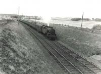 A St Enoch - Stranraer Boat Express runs south through Monkton on 20 July 1959 behind Fairburn 2-6-4T 42193. [Ref query 3 March 2018] <br><br>[G H Robin collection by courtesy of the Mitchell Library, Glasgow 20/07/1959]