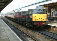 Scene at Westbury on 2 August 2002 with a shuttle service to Weymouth at platform 2. Fragonset Rail locomotive 31602 <I>'Chimera'</I> is seen here on the south end of the train, with 31459 <I>'Cerberus'</I> at the rear.<br><br>[Ian Dinmore 02/08/2002]