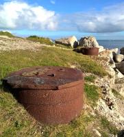Looking West across the surviving girder supports at the north end of the Fleet Viaduct (also referred to locally as the Ferry Bridge) towards Portland Bill in February 2018. The line closed in 1965 and the viaduct was demolished in 1971. [Ref query 4 March 2018]<br><br>[Ken Strachan 17/02/2018]