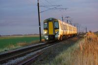 A London to Kings Lynn service approaches Hilgay LC in the late afternoon sunshine of 21 February 2018. There had been a station here until 1963 but no trace was found.<br><br>[John McIntyre 21/02/2018]