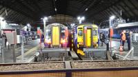 Evening at Glasgow Queen St on 5th February 2018 with 380101 and 156504 in the platforms, the latter recently arrived from Dunblane. On my first trip in a refurbished Class 156 I found the new seats to be rock hard and not really suitable for a long run to Oban or Fort William.<br>
<br><br>[Douglas McPherson 05/02/2018]