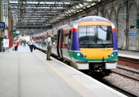 A colourful 170422, still sporting its old National Express livery, boarding at Waverley platform 11 on 5 July 2007. The train is a First ScotRail service to Glasgow Queen Street.   <br><br>[John Furnevel 05/07/2007]