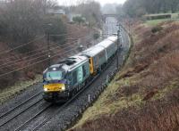 After a great deal of 'will they - won't they?' speculation the DRS Class 68s have taken over one of the Cumbrian Coast passenger diagrams. 68018 <I>Vigilant</I> hauled the first southbound service, now restricted to three coaches, with 68017 <I>Hornet</I> on the rear to power the return leg. The first train is seen at Forton heading for Preston on Monday 12th March 2018.   <br><br>[Mark Bartlett 12/03/2018]