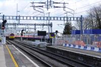 A trip to Didcot on 8th March 2018 showed that the electrics are beginning to take over and I guess within a year most of the diesel powered passenger services will have gone. I'm told it is hoped the electric power will be on to Swindon and Royal Wootton Bassett by August. The new extension on Platforms 2 and 3 is also taking shape.<br>
<br><br>[Peter Todd 08/03/2018]