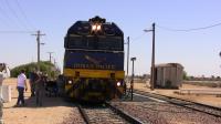 A picture to warm you up on a cold day. The <I>Indian Pacific</I>, bound for Sidney, pauses at the abandoned railway town of Cook in the middle of the Nullarbor Plain in 30+ degree heat on 25/09/08.<br>
<br><br>[Colin Miller 25/09/2008]