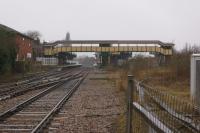 Looking west from the LC at March on 19 February 2018 with the former platforms to Whitemoor yard and Spalding on the right. Access to Whitemoor yard is still possible from the east with another junction on the Peterborough line beyond the station. To compare the view almost 22 years earlier [See image 39319]<br><br>[John McIntyre 19/02/2018]