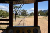 Typical countryside traversed by the old metre gauge line to Franschhoek, and now used by vintage style diesel trams conveying visitors around the local vineyards. This is the view ahead from behind the controls. on 23rd February 2018 - a bit warmer here (35c) than it was in the UK at this time.<br>
<br>
<br><br>[Peter Todd 23/02/2018]