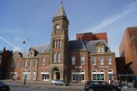 The Cheshire Lines station in Southport had a frontage onto the main shopping street, Lord Street. The clocktower has the letters SCLER carved beneath the clock referring to the Southport and Cheshire Lines Extension Railway. Entrance to the station was through the arch at the bottom of the tower however since the station closed in 1952 the platform area was filled in and used as a bus station. Today the arch leads to a national supermarket chain and the building is in use for various commercial purposes.<br><br>[John McIntyre 09/03/2018]