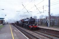 The mornings may be becoming brighter earlier but 0630 hrs on 17 March 2018 was still quite a challenge to capture Jubilee 45690 'Leander' and Black 5 45157 'Glasgow Highlander' charge through Leyland with the Carnforth to Buxton 'The High Peak Explorer'. In case there is any doubt, the Black 5 is actually 45407 but has again been turned out as 45157 for the 2018 season.<br><br>[John McIntyre 17/03/2018]