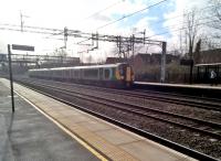 Sadly, there is just one passenger awaiting the 11.00 to Crewe on 1st February 2018. I had arrived just in time to catch a freight off the Nuneaton North Chord, but a Pendolino got in the way - this photograph was my consolation prize.<br><br>[Ken Strachan 01/02/2018]