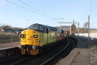 Colas Rail 37099 brings up the rear on a Network Rail Management Train that was working from Derby to Carlisle via the Cumbrian Coast line on 13th March 2018. Pulling power on this leg was fellow EE Type 3 37421.<br><br>[Mark Bartlett 13/03/2018]