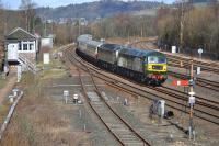 Brush type 4s D1935 and D1944 (alias 47805 and 47501, owned by Locomotive Services Ltd) pass Stirling North signalbox with a returning Kingussie - Crewe private charter.<br><br>[Bill Roberton 25/03/2018]