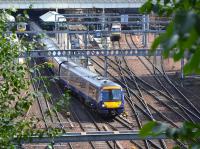 170432 leads a Glasgow Queen Street service out of Edinburgh Waverley on 8th August 2017. In the middle background can be seen groundworks for the extension to Platform 12.<br>
<br>
<br><br>[Bill Roberton 08/08/2017]