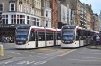 Trams 254 and 272 pass at the foot of The Mound, a little to the east of Princes Street stop on 8th August 2017.<br>
<br>
<br><br>[Bill Roberton 08/08/2017]