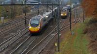 1S42 Euston - Glasgow Central Pendolino passing an undentified Freightliner 66 hauled freight, probably heading for Coatbridge. 5th November 2017.<br>
<br>
<br><br>[David Prescott 05/11/2017]