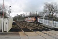 Green Road station, an unstaffed halt on the Cumbrian Coast line near Millom. For many years now the station has been cared for by a community group and the flower and plant displays have won several awards. A working party was on the station on 8th March 2018 when this view was taken from the level crossing looking towards Millom. <br><br>[Mark Bartlett 08/03/2018]