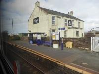 Grab shot, from a northbound train, of the Barrow platform at Drigg on 13th March 2018. Since my last visit [See image 44028] the portable steps have been replaced with a <I>Harrington Hump</I>, as at most of the stations on this line.  <br><br>[Mark Bartlett 13/03/2018]