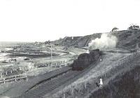 BR Standard class 2 2-6-0 no 78053 photographed at Golf Club House Halt, shortly after leaving Banff for Tillynaught on 11 August 1961.<br><br>[G H Robin collection by courtesy of the Mitchell Library, Glasgow 11/08/1961]